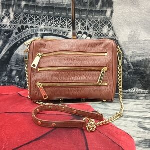 The Rebecca Minkoff Mini 5-Zip Rocker Crossbody Bag